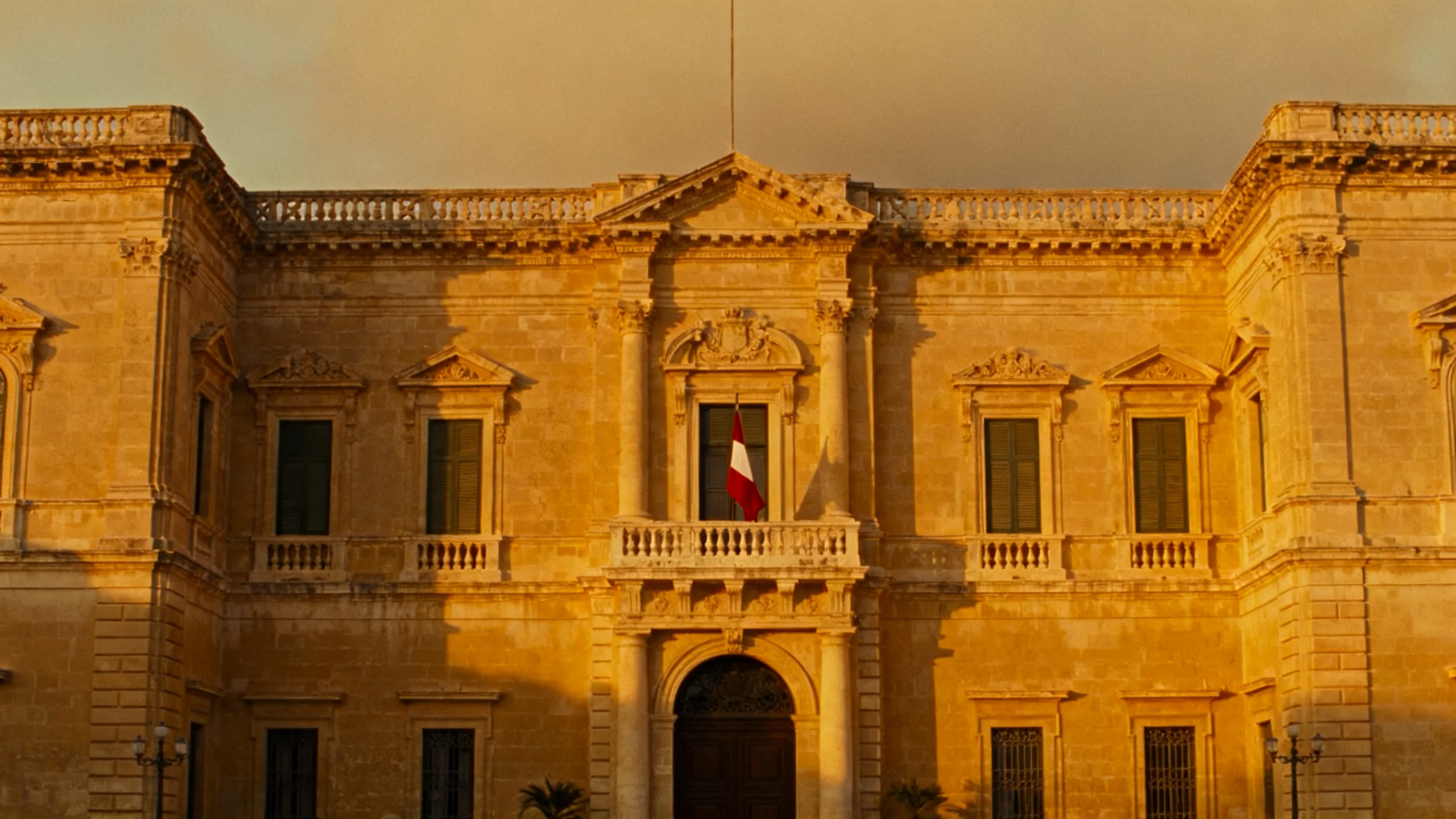 The Auberge de Castille in Valletta, the Knights' Spanish-Portuguese-Aragonese lodging, baroque facade lit at sunset